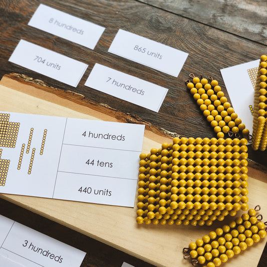 Montessori Place value with golden beads matching cards - montessorikiwi