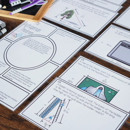 Assorted worksheets and task cards related to Pythagoras' theorem spread out on a table, with writing and illustrations on them.